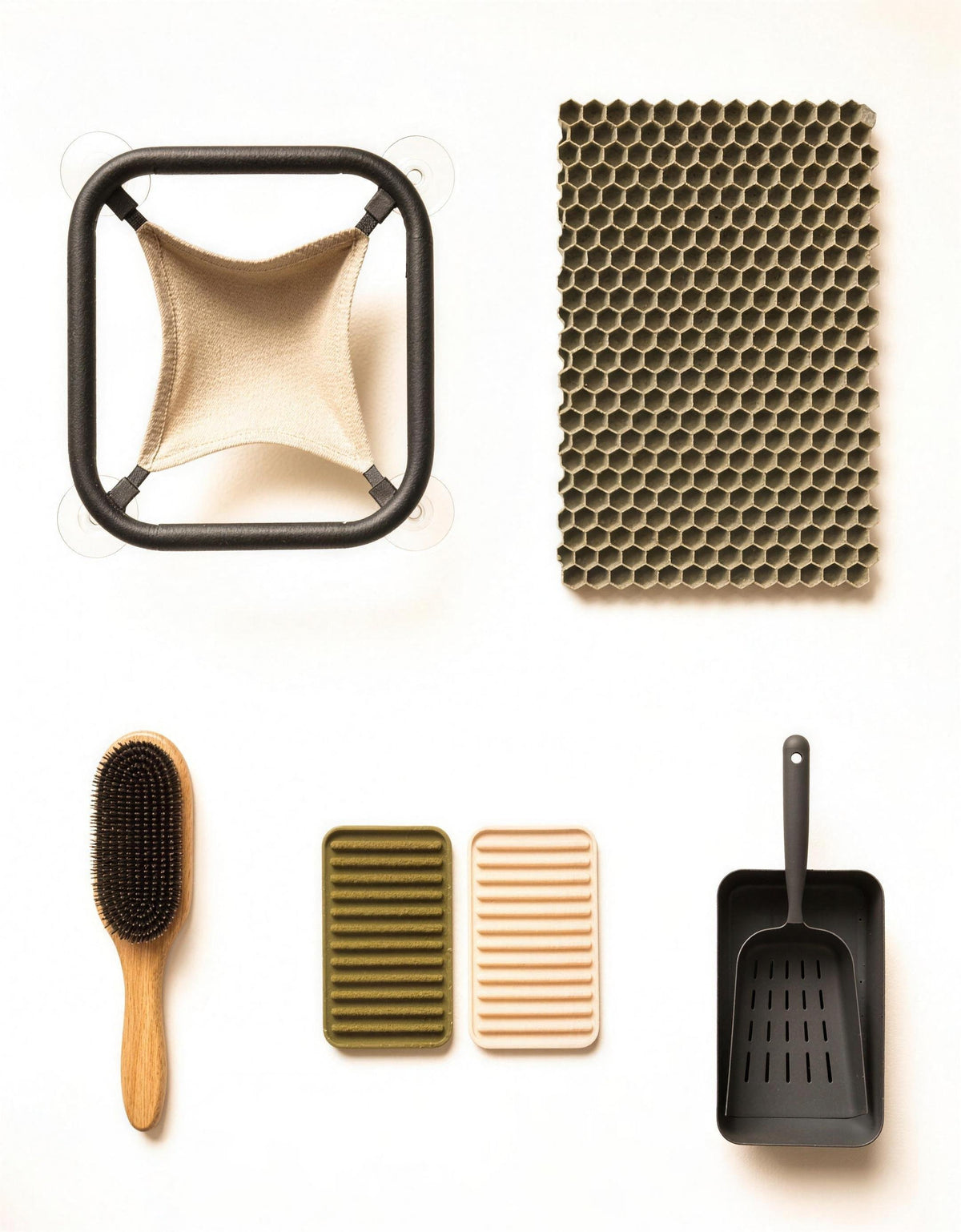 Alle fünf Purrfolk-Essentials von oben auf hellem Untergrund angeordnet